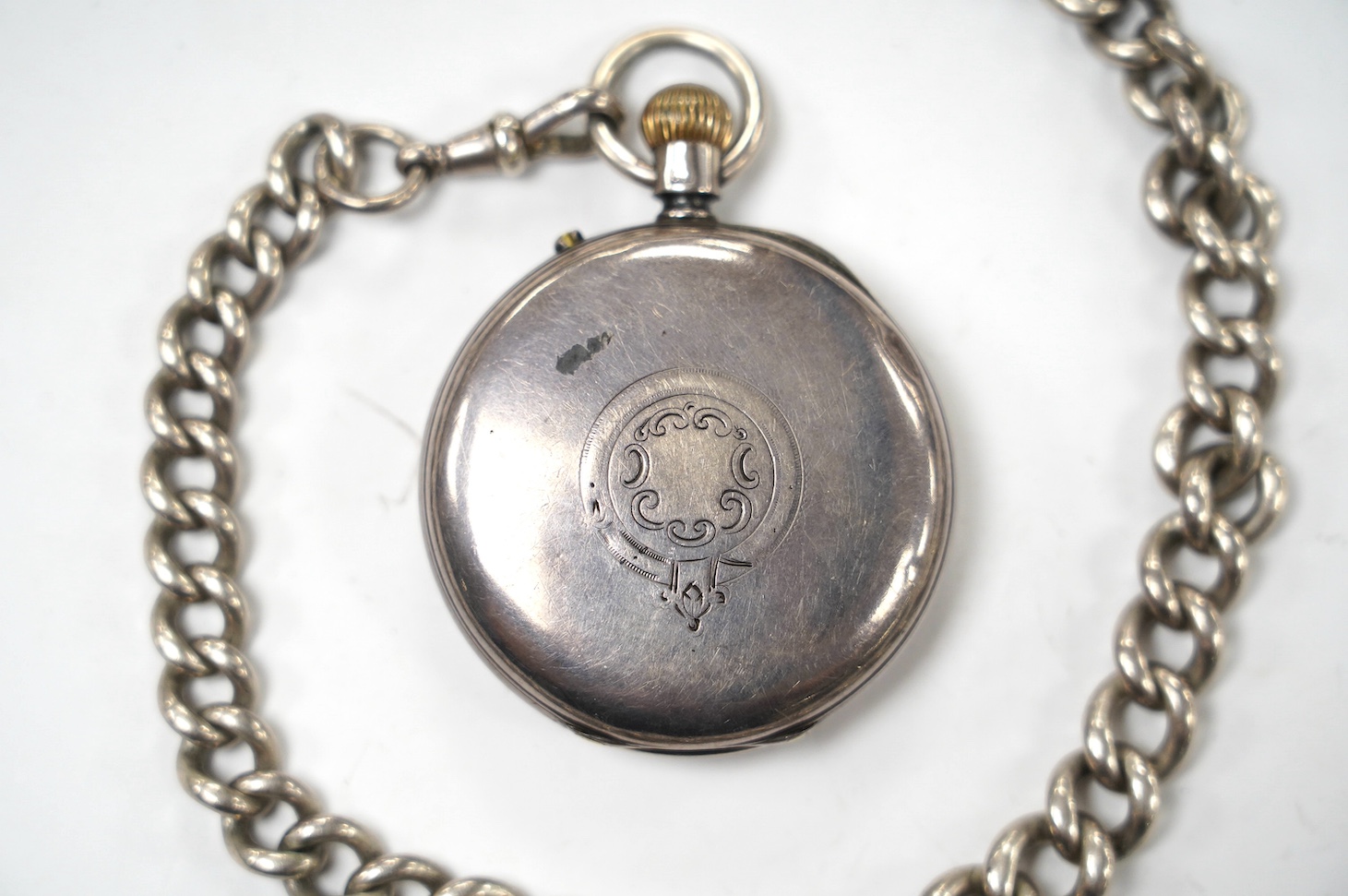 A late Victorian silver open face pocket watch, by J.W. Benson, with Roman dial and subsidiary seconds, together with a silver albert. Condition - poor to fair